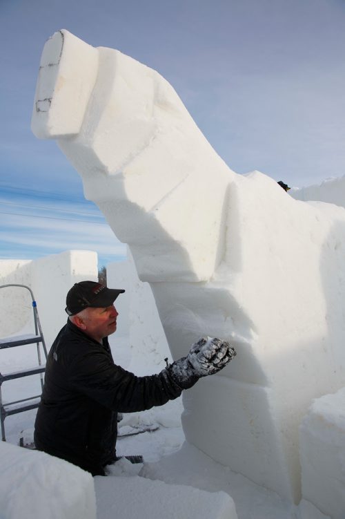 MIKE DEAL / WINNIPEG FREE PRESS
Snow carver, Lyle Peters, from Steinbeck, works on some sculptures the day before the big grand opening.
Clint and Angie Masse who own A Maze in Corn near St. Adolphe have constructed a maze made of snow they hope will break a world record.
190104 - Friday, January 04, 2019.