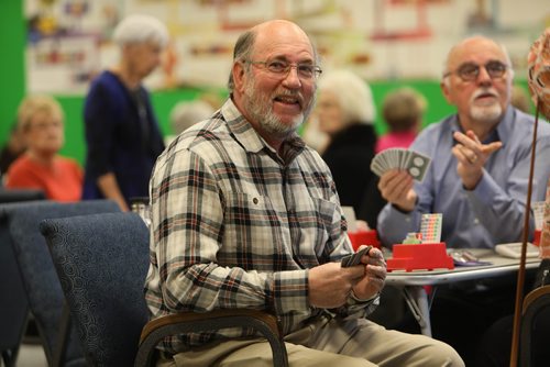 RUTH BONNEVILLE / WINNIPEG FREE PRESS

Story for Sunday feature: Bridge players build community around card tables at Soul Sanctuary church.
 
Set of action shots of people playing pool Wednesday afternoon.  

Photo of John Hindle.  

See Brenda Suderman story. 

 Jan 02, 2019 
