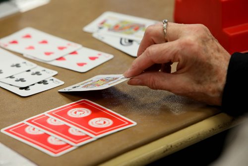 RUTH BONNEVILLE / WINNIPEG FREE PRESS

Story for Sunday feature: Bridge players build community around card tables at Soul Sanctuary church.
 
Set of action shots of people playing pool Wednesday afternoon.  

See Brenda Suderman story. 

 Jan 02, 2019 
