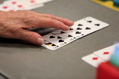 RUTH BONNEVILLE / WINNIPEG FREE PRESS

Story for Sunday feature: Bridge players build community around card tables at Soul Sanctuary church.
 
Set of action shots of people playing pool Wednesday afternoon.  

See Brenda Suderman story. 

 Jan 02, 2019 
