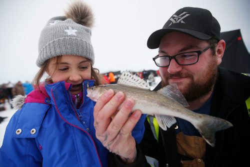 JOHN WOODS / WINNIPEG FREE PRESS
Eric Brisson and his niece Aubrey check out their fish at KidFish Ice Derby in Selkirk in support of The Children's Hospital Foundation and CancerCare Manitoba Foundation Sunday, January 6, 2019.