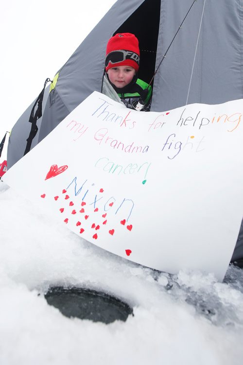 JOHN WOODS / WINNIPEG FREE PRESS
Nixon Buskell fishes beside the sign Nixon made for his grandma Kim at KidFish Ice Derby in Selkirk in support of The Children's Hospital Foundation and CancerCare Manitoba Foundation Sunday, January 6, 2019.
