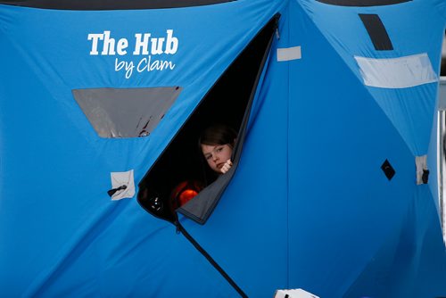 JOHN WOODS / WINNIPEG FREE PRESS
A young girl looks out of a fishing tent at KidFish Ice Derby in Selkirk in support of The Children's Hospital Foundation and CancerCare Manitoba Foundation Sunday, January 6, 2019.