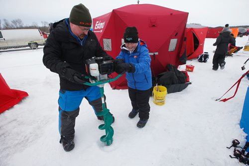 JOHN WOODS / WINNIPEG FREE PRESS
Mike and his son Colin make a hole to fish at KidFish Ice Derby in Selkirk in support of The Children's Hospital Foundation and CancerCare Manitoba Foundation Sunday, January 6, 2019.