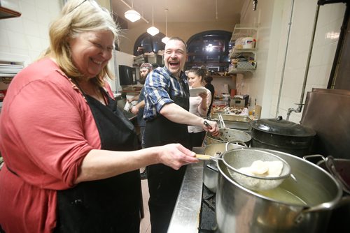 JOHN WOODS / WINNIPEG FREE PRESS
Colleen Swifte, owner of Alycia's, and her son-in-law Aaron Blanchard, grandson of the original Alycia's Marion Staff, serve up Ukrainian Christmas Eve Dinner at  Alycia's Sunday, January 6, 2019.