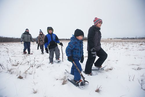 JOHN WOODS / WINNIPEG FREE PRESS
From left, Trevor and Matthew Pfahl, and Mohamad Cheaito from Lebanon with sons Hussein, Ahmad, and Najeb enjoy some snowshoeing on Snowshoe Sunday at Living Prairie Museum Sunday, January 6, 2019. Snowshoe Sundays will be held the first and last Sunday of January and February from 10-4.