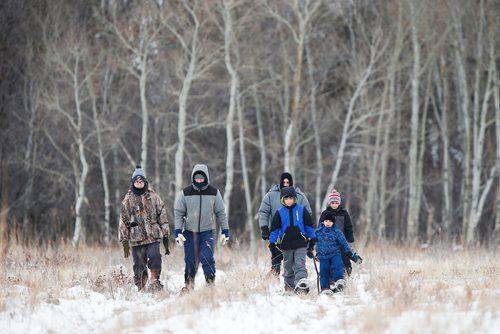 JOHN WOODS / WINNIPEG FREE PRESS
From left, Matthew and Trevor Pfahl, and Mohamad Cheaito from Lebanon with sons Hussein, Ahmad, and Najeb enjoy some snowshoeing on Snowshoe Sunday at Living Prairie Museum Sunday, January 6, 2019. Snowshoe Sundays will be held the first and last Sunday of January and February from 10-4.