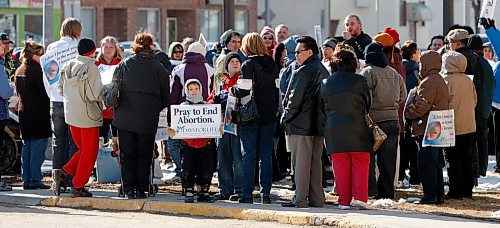 BORIS MINKEVICH / WINNIPEG FREE PRESS 090405 Closing rally for the Winnipeg event called "40 Days of Life". Photo taken in front of the Women's Hospital on Notre Dame. Boy holding the sign is unidentified.