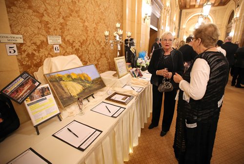 JASON HALSTEAD / WINNIPEG FREE PRESS

Attendees check out silent auction items at the Anxiety Disorders Association of Manitoba's Eve for ADAM gala fundraiser Nov. 10, 2018 at the Hotel Fort Garry's Crystal Ballroom. (See Social Page)