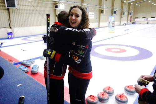 JOHN WOODS / WINNIPEG FREE PRESS
Mackenzie Zacharias is hugged by her dad and coach Sheldon Zacharias as her team defeated Meghan Walter in the Manitoba Junior Championships Monday, January 6, 2019.