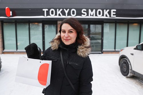 MIKE DEAL / WINNIPEG FREE PRESS
Jen Zoratti outside Tokyo Smoke in Osborne Village while doing a first-person story on the experience of buying pot. 
190108 - Tuesday, January 8, 2019