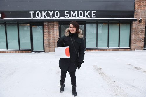 MIKE DEAL / WINNIPEG FREE PRESS
Jen Zoratti outside Tokyo Smoke in Osborne Village while doing a first-person story on the experience of buying pot. 
190108 - Tuesday, January 8, 2019