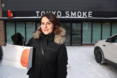 MIKE DEAL / WINNIPEG FREE PRESS
Jen Zoratti outside Tokyo Smoke in Osborne Village while doing a first-person story on the experience of buying pot. 
190108 - Tuesday, January 8, 2019