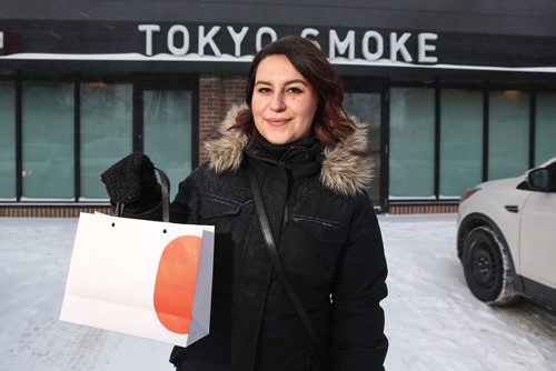 MIKE DEAL / WINNIPEG FREE PRESS
Jen Zoratti outside Tokyo Smoke in Osborne Village while doing a first-person story on the experience of buying pot. 
190108 - Tuesday, January 8, 2019