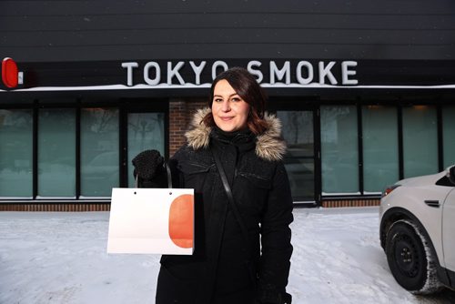 MIKE DEAL / WINNIPEG FREE PRESS
Jen Zoratti outside Tokyo Smoke in Osborne Village while doing a first-person story on the experience of buying pot. 
190108 - Tuesday, January 8, 2019