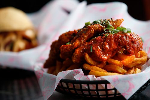 JOHN WOODS / WINNIPEG FREE PRESS
Honey Butter chicken strips with green onion and sesame seeds and fries photographed at The Handsome Daughter/Magic Bird Fried Chicken Tuesday, January 8, 2019.