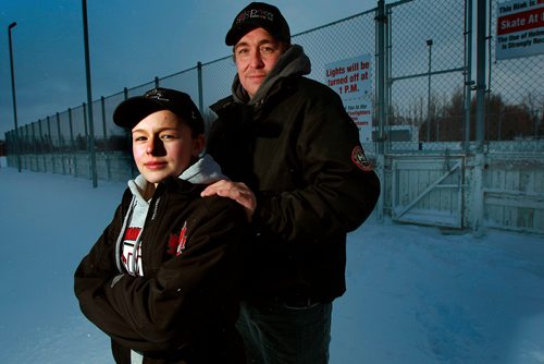 PHIL HOSSACK / WINNIPEG FREE PRESS -  Glenn Grove and his daughter Trinity (15yrs) pose at the community skating rink across from their St Andrews home Tuesday. Trinity was kicked off the rink after discovering there was a new$60 fee instituted ast the community centre's outdoor facility. - January 8, 2019.