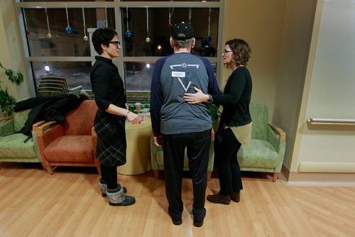 PHIL HOSSACK / WINNIPEG FREE PRESS - Kerri Peskach (right) visits with her sister Tara (left) at the care facility in Selkirk with her father Terry Law, he lives in the long term care facility due to dementia. Joel Schlessinger's story. January 8, 2019
