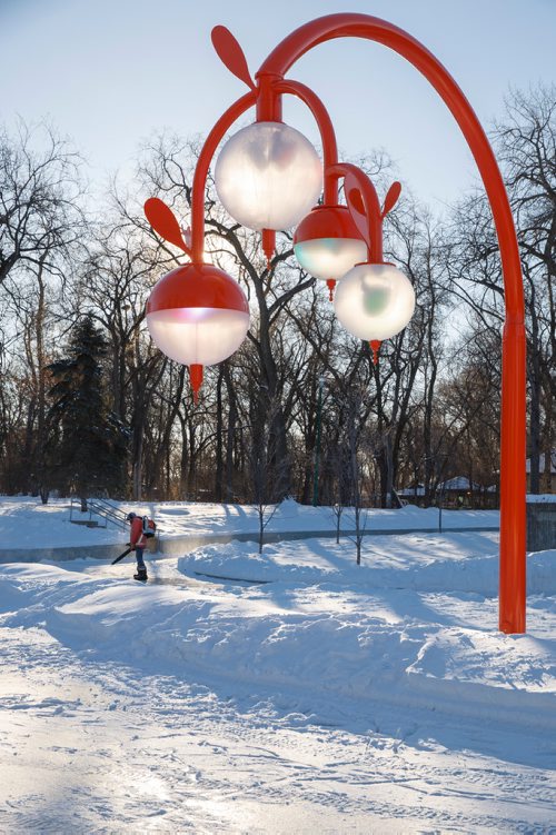 MIKE DEAL / WINNIPEG FREE PRESS
City crews hard at work clearing snow from around the frozen pond at Kildonan Park Wednesday morning. The official opening of Bokeh,  an artwork partnership with Takashi Iwasaki and Nadi Design, will be lit up during a party at the Kildonan Park Pond this Saturday (January 12, 2019) evening with a family skating party from 5 - 7:30pm. The opening will include music from DJ Mama Cutsworth and DJ Hunnicutt. 
190109 - Wednesday, January 09, 2019.