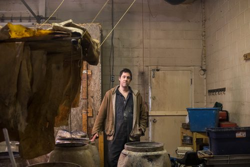 MIKAELA MACKENZIE / WINNIPEG FREE PRESS
Carl Froese, owner of Manitoba Buckskin, poses for a portrait in his workspace after being robbed of traditional family heirlooms and shop equipment overnight in Winnipeg on Wednesday, Jan. 9, 2019. The door behind is the door that the robbers got in.
Winnipeg Free Press 2018.