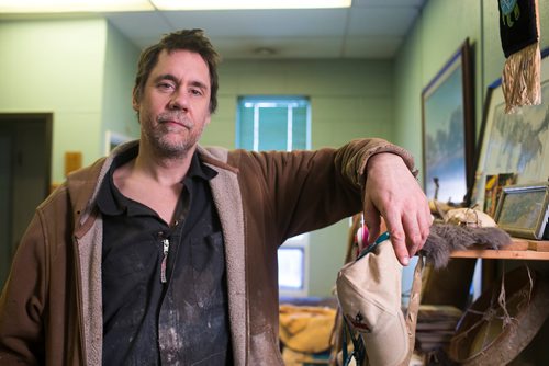 MIKAELA MACKENZIE / WINNIPEG FREE PRESS
Carl Froese, owner of Manitoba Buckskin, poses for a portrait in his workspace after being robbed of traditional family heirlooms (from this shelf) and shop equipment overnight in Winnipeg on Wednesday, Jan. 9, 2019. 
Winnipeg Free Press 2018.