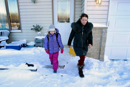 PHIL HOSSACK / Winnipeg Free Press - Petra McGowan and her daughter Emerson pose in their St Anne Manitoba home Wednesday, Petra would like to see seatbelts on school buses. See story.  January 9, 2019.
