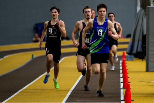 PHIL HOSSACK / Winnipeg Free Press - PHIL HOSSACK / Winnipeg Free Press - Winnipeg Optimist Club's Daniel Turon grabbed the lead position and held on to the finish line of the men's 300 metre run Wednesday evening as the 2019Bison Grand Prix # 1 got underway.   January 9, 2019.   Wednesday evening as the 2019Bison Grand Prix # 1 got underway.   January 9, 2019.