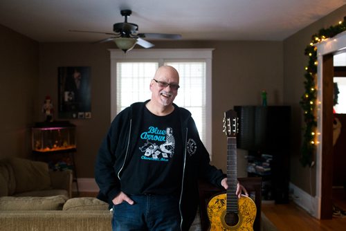 MIKAELA MACKENZIE / WINNIPEG FREE PRESS
Stu Reid poses for a portrait in the "Stu Dome," also known as his living room, where he hosts frequent house concerts in Winnipeg on Thursday, Jan. 10, 2019. The guitar has been signed by all of the performers he's had in his home (the strings had to be taken off to make room for more signatures).
Winnipeg Free Press 2018.