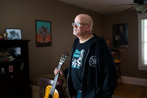 MIKAELA MACKENZIE / WINNIPEG FREE PRESS
Stu Reid poses for a portrait in the "Stu Dome," also known as his living room, where he hosts frequent house concerts in Winnipeg on Thursday, Jan. 10, 2019. The guitar has been signed by all of the performers he's had in his home (the strings had to be taken off to make room for more signatures).
Winnipeg Free Press 2018.