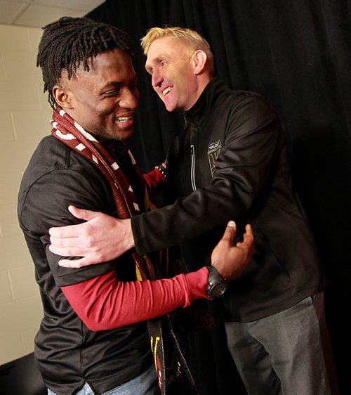 PHIL HOSSACK / WINNIPEG FREE PRESS - Raphael Ohin newly signed with the Valour FC is embraced by Coach and GM Rob Gale. See Mike Sawatzky's story. January 10, 2019