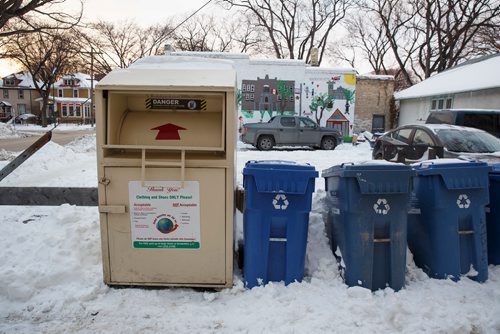 MIKE DEAL / WINNIPEG FREE PRESS
A Global Recycling and AID Inc. donation bin sits across the street from Ecole Laura Secord School on Wolseley Avenue. 
190110 - Thursday, January 10, 2019.
