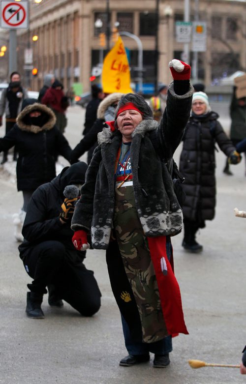 PHIL HOSSACK / WINNIPEG FREE PRESS - Protest organizer Alma Kakikepinace dances in the middle of Portage and Main Thursday. See Kevin Rollason's story. January 10, 2019