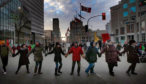 PHIL HOSSACK / WINNIPEG FREE PRESS - Protestors dance at Portage and Main Thursday. See Kevin Rollason's story.  January 10, 2019