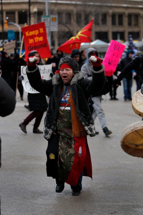 PHIL HOSSACK / WINNIPEG FREE PRESS - Protest organizer Alma Kakikepinace dances in the middle of Portage and Main Thursday. See Kevin Rollason's story. January 10, 2019