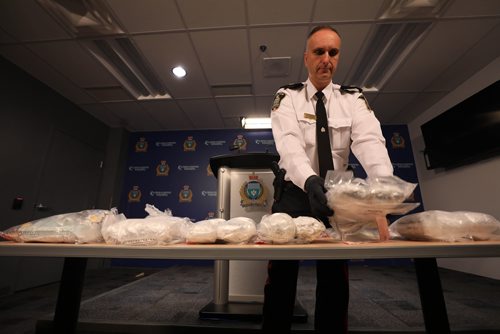 RUTH BONNEVILLE / WINNIPEG FREE PRESS

Winnipeg Police Inspector, Max Waddell, stands next to 3 tables of drugs that were seized in the last 50 days by the Winnipeg Police Drug Enforcement and Street Crime Unit at WPS HQ during press conference, Friday.  

On the 3 tables are 10, 1 Kg bags of Meth with a street value $100,000.  One bag of meth has the potential of creating a high that could last days for over 100 000 people. Other drugs are also on the table including fentanyl and heroin with a total street value of the drugs seized being over $1,014 000. 



Jan 11th, 2019 

