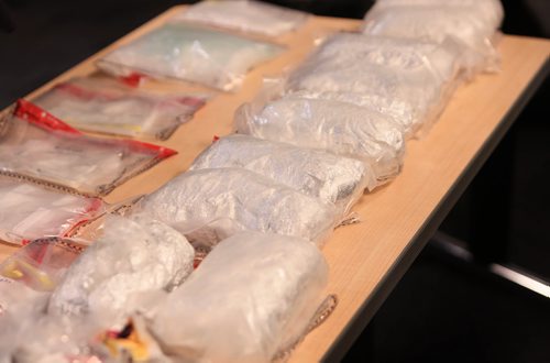 RUTH BONNEVILLE / WINNIPEG FREE PRESS

Photo of a row of 1 Kg  bags of Methamphetamine (front row), each with a street value $100,000, taken during press conference with Winnipeg Police Inspector Max Waddell at the WPS HQ, Friday.  

A total of 10, 1 KG bags of meth, were seized by the  Winnipeg Police Drug Enforcement and Street Crime Unit  in the last 50 days.   Along with the meth were other drugs including fentanyl and heroin.  The total street value of the drugs is estimated to be over $1,014 000. 

Note: One bag of meth has the potential of creating a high that could last days for over 100 000 people.

  

Jan 11th, 2019 
