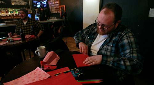 PHIL HOSSACK / WINNIPEG FREE PRESS - Cole Swier works away as group of men and boys in Winnipeg Make  Valentine's Day cards for women in shelters. This is the third consecutive year they've done it. It's happening at the Good Will Social Club, See release.  January 12, 2019