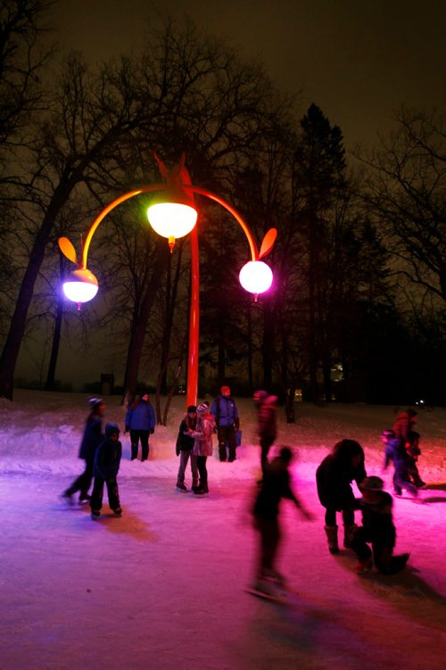 PHIL HOSSACK / WINNIPEG FREE PRESS - STAND-UP - Skates party under the glow of new 'Art' light stands Friday evening at a free family skating party starting at 5 p.m. to celebrate the official opening of Bokeh, a new artwork by Takashi Iwasaki and Nadi Design, at the pond in Kildonan Park.  See release.  January 12, 2019