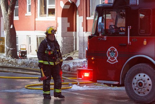 MIKE DEAL / WINNIPEG FREE PRESS
Winnipeg Fire Paramedic Service crews are using an aerial ladder to fight the fire in an apartment building on Maryland between Ellice and St. Matthews avenues.
190114 - Monday, January 14, 2019.