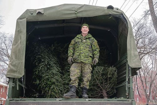 Canstar Community News Jan. 5 - Members of Minto Armoury's 38 Service Battalion picked up old Christmas trees in Wolselely and Minto on Jan. 5 as part of an annual service to the community. (EVA WASNEY/CANSTAR COMMUNITY NEWS/METRO)