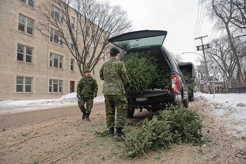 Canstar Community News Jan. 5 - Members of Minto Armoury's 38 Service Battalion picked up old Christmas trees in Wolselely and Minto on Jan. 5 as part of an annual service to the community. (EVA WASNEY/CANSTAR COMMUNITY NEWS/METRO)