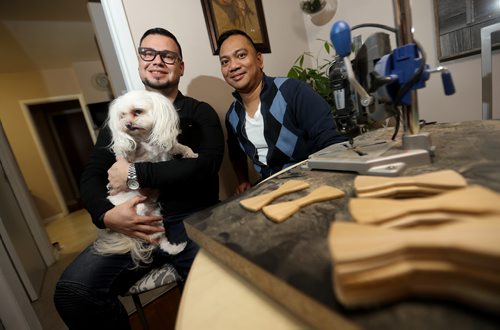 TREVOR HAGAN / WINNIPEG FREE PRESS
Eddie and Ryan Mendoza, owners of Charlies Charmed fashion accessories for men, with Charlie, Monday, January 14, 2019. for dave sanderson intersection