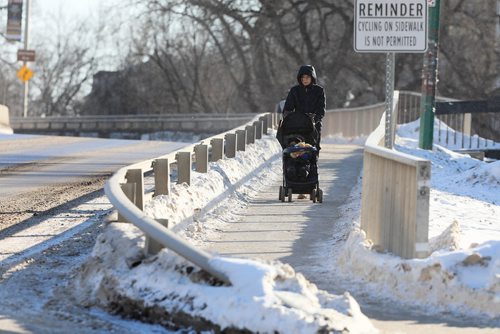 RUTH BONNEVILLE / WINNIPEG FREE PRESS

Photos of pedestrian pushing baby carriage as they cross  the Midtown Bridge for story on announcement that The Winnipeg Foundation plans on funding the construction of a new pedestrian and bicycle bridge across the Assiniboine River between the park that is midway between Osborne and Donald on River Avenue and the other side.

More info - Winnipeg Foundation
Giving city $5 million worth of money so it can renovate the citys archive building (former Carnegie library on William Avenue) and build a new pedestrian and bicycle bridge across the Assiniboine River between the park that is midway between Osborne and Donald on River Avenue and the other side. They want the projects done by 2021, the 100th anniversary of The Winnipeg Foundation.

See Kevin Roll-on story


Jan 15th, 2019 

