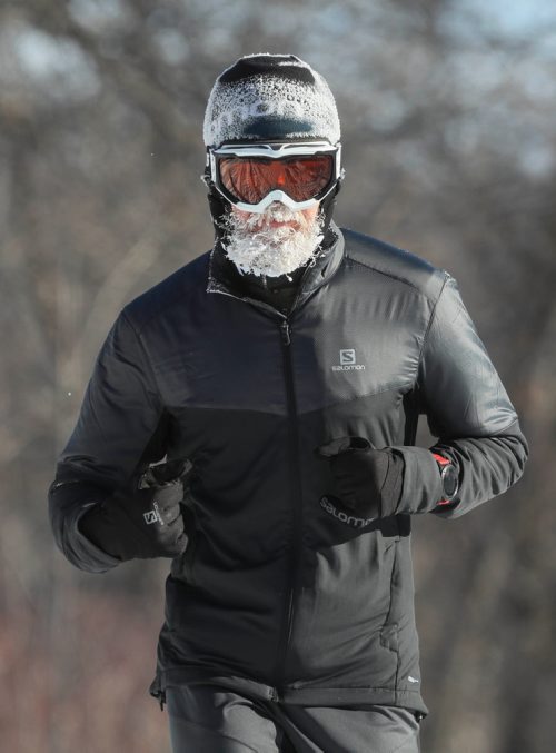 RUTH BONNEVILLE / WINNIPEG FREE PRESS

Weather standup.
Cold-weather runner. Ice crystals accumulate on the whiskers of a  runner as he makes his way through Assiniboine Park Wednesday.
(don't have his name because he didn't stop when asked for it).

Jan 16th, 2019 
