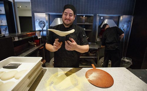 MIKE DEAL / WINNIPEG FREE PRESS
Carbone Club Cafe
260 St Mary Ave
Chef Aaron McPherson tosses some dough for a pizza.
190118 - Friday, January 18, 2019.