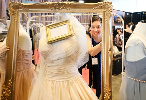RUTH BONNEVILLE / WINNIPEG FREE PRESS

Amanda  Murdock owner of pearl & birch wedding consignment store, at her booth at the  The Wonderful Wedding Show at RBC Convention Centre, Saturday. 

Jan 19th, 2019 
