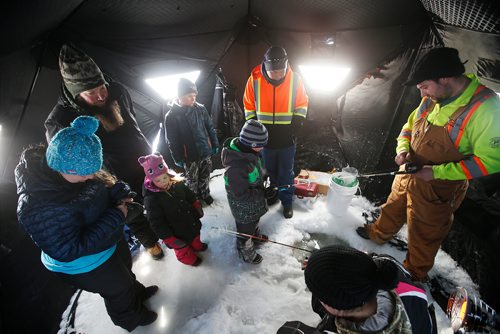 JOHN WOODS / WINNIPEG FREE PRESS
From right, Mike and Kathleen Melnychuk, Angling and events coordinator for the Manitoba Wildlife Federation, teach ice fishing during Winterfest at Fort Whyte Alive in Winnipeg  Sunday, January 20, 2019.