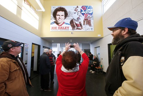 JOHN WOODS / WINNIPEG FREE PRESS
People look up at a mural unveiled in honour of former Winnipeg Jet  Joe Daley at the Bronx Community Centre in Winnipeg  Sunday, January 20, 2019.