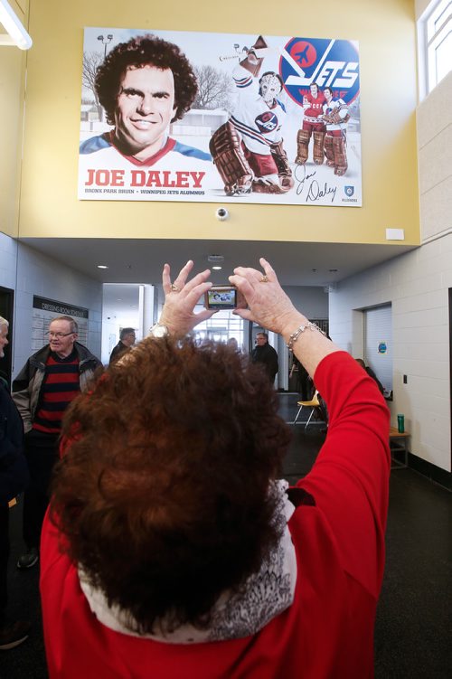 JOHN WOODS / WINNIPEG FREE PRESS
Darlene Daley, wife of Joe Daley, photographs a mural unveiled in honour of former Winnipeg Jet  Joe Daley at the Bronx Community Centre in Winnipeg  Sunday, January 20, 2019.