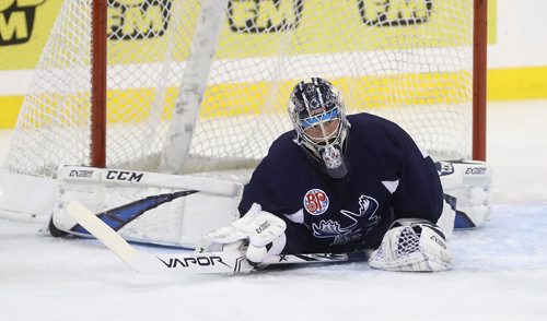 TREVOR HAGAN / WINNIPEG FREE PRESS
Manitoba Moose goaltender Eric Comrie (1) during practice at Bell MTS Place, Monday, January 21, 2019.